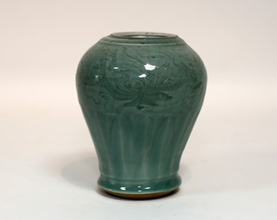 Lot 594 - A 17th Century Chinese celadon vase with...