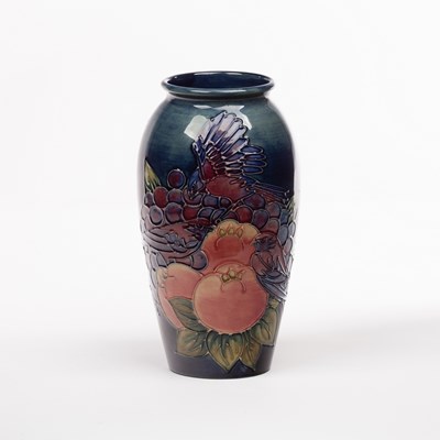 Lot 714 - Moorcroft, a Finches pattern vase designed by...