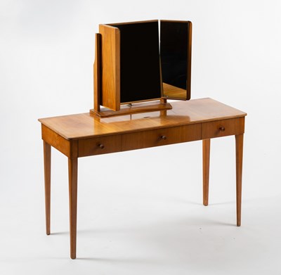 Lot 972 - Gordon Russell Workshops/A walnut dressing...