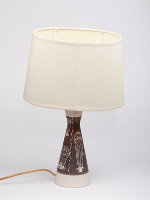 Lot 985 - A mid-20th Century pottery bedside lamp, hot...