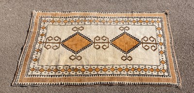 Lot 987 - A mid-20th Century rug/design of twin diapers...