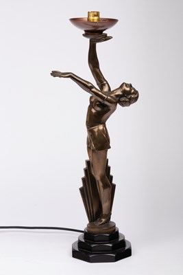 Lot 1003 - An Art Deco style figural lamp, the bronzed...