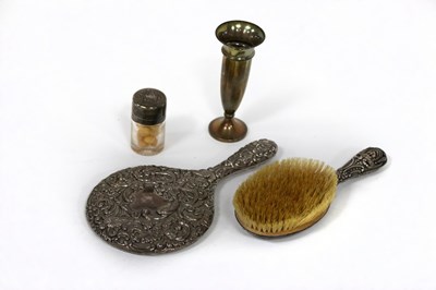 Lot 31 - An Edwardian silver backed hand mirror, WJM &...