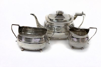 Lot 55 - A George III three-piece silver tea set, Alice...