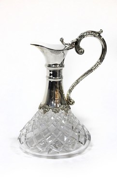 Lot 68 - A silver mounted cut glass claret jug,...