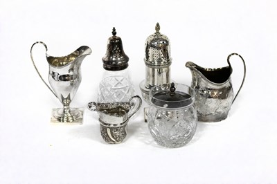 Lot 75 - A George III silver cream jug, London 1799, of...