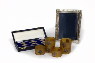 Lot 96 - A set of six silver place card holders, Albert...