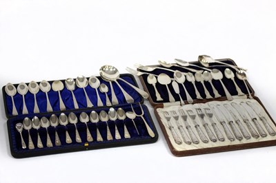 Lot 98 - Twelve Edwardian silver teaspoons, Levi &...