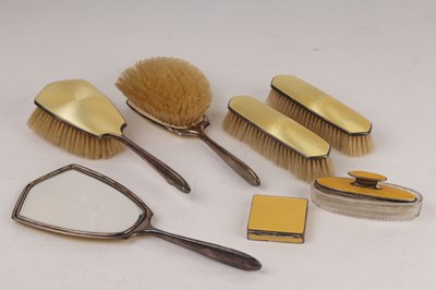 Lot 103 - A silver and yellow enamel dressing table set,...