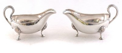 Lot 131 - A pair of George III Sheffield plate sauce boats