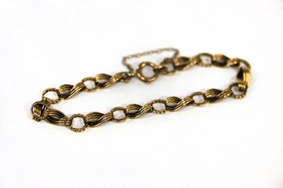 Lot 154 - A 9ct yellow gold fancy link bracelet, with...