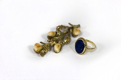 Lot 167 - An 18ct gold and lapis dress ring, circa 1980,...