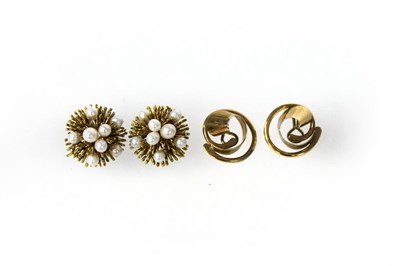 Lot 176 - A pair of 9ct yellow gold ear clips of spiral...