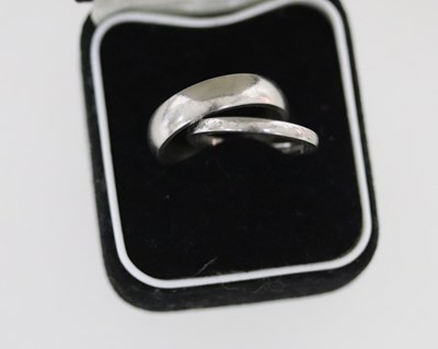 Lot 196 - Two platinum wedding bands, approximately 12.1gm