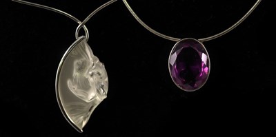 Lot 200 - A Lalique 'Acrobate' pendant necklace set in...