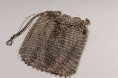 Lot 201 - A silver mesh evening bag with draw strings...