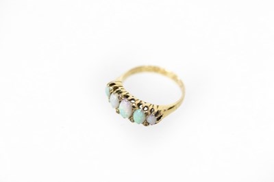 Lot 211 - An opal five-stone ring, the row of five...