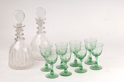 Lot 242 - A pair of triple-ring neck decanters and...