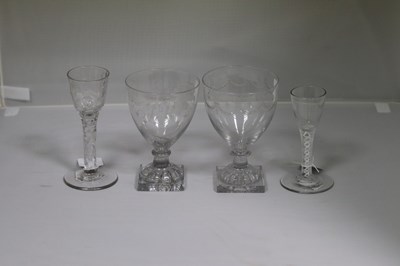 Lot 246 - An 18th Century wine glass with faceted stem,...