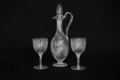 Lot 248 - A Victorian etched glass ewer and two matching...