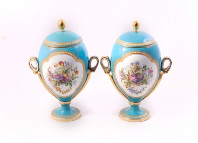 Lot 287 - A pair of ovoid porcelain vases and covers,...