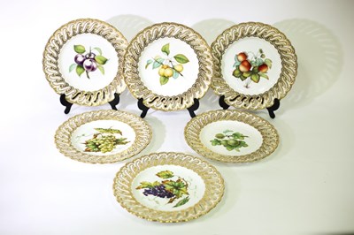 Lot 310 - A set of six Coalport plates painted fruit...