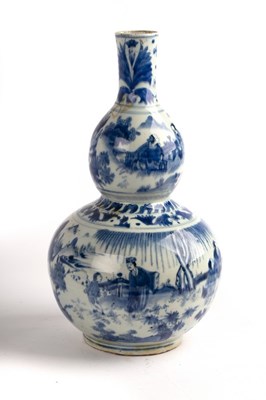 Lot 363 - A Chinese blue and white double gourd vase,...