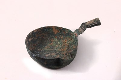 Lot 370 - A Han dynasty bronze pouring vessel, with...