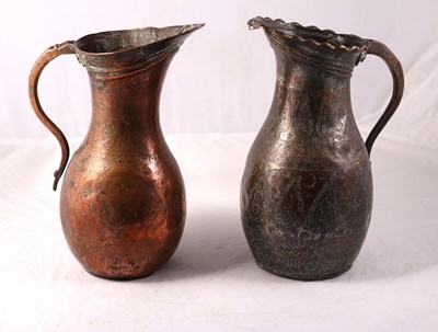 Lot 373 - Two silver on copper Persian/Safavid wine jugs,...