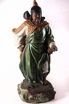 Lot 374 - A Chinese pottery figure of Han Xin, King of...