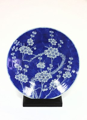 Lot 396 - A Japanese blue and white charger, decorated...