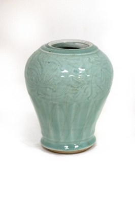 Lot 422 - A 17th Century Chinese celadon vase with...