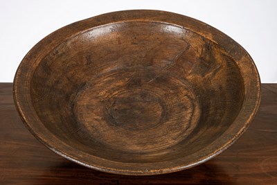 Lot 444 - A 19th Century sycamore dairy bowl, 45cm diameter