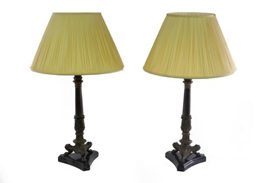 Lot 459 - A pair of French Empire style bedside lamps