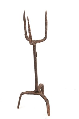 Lot 462 - A wrought iron pricket candlestick, probably...