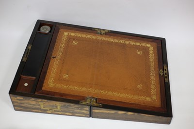 Lot 476 - A coromandel lap desk with leather lined...