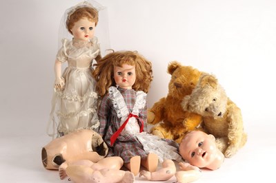 Lot 488 - Two vintage Teddy bears and various dolls, one...