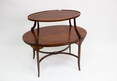 Lot 516 - A mahogany and crossbanded oval two-tier table,...