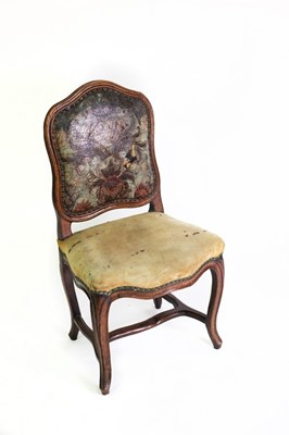 Lot 518 - A Continental walnut framed chair with leather...