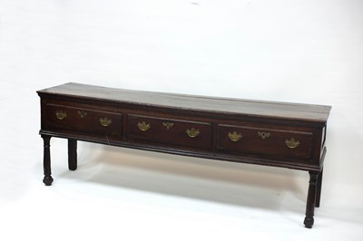 Lot 520 - An 18th Century oak dresser base fitted three...