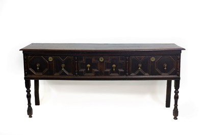 Lot 521 - An oak dresser of Jacobean design with moulded...