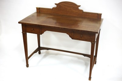 Lot 524 - An Edwardian satinwood kneehole dressing table,...