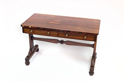 Lot 531 - A Regency rosewood library table fitted two...