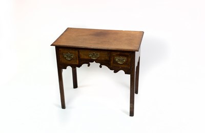 Lot 533 - An early 19th Century oak kneehole table...