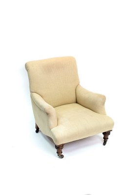 Lot 543 - A late Victorian low armchair on turned front...