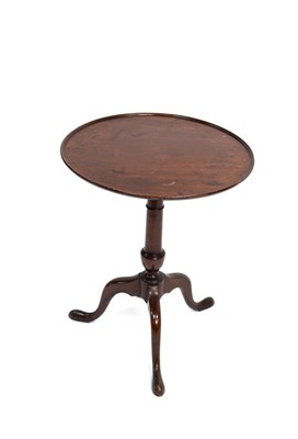 Lot 544 - A 19th Century mahogany tripod table, the...