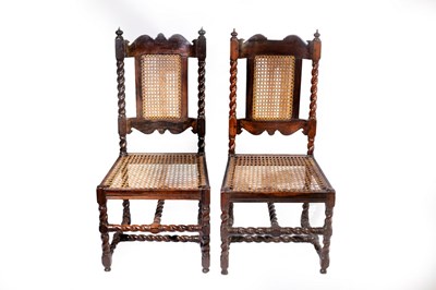 Lot 546 - A pair of Dutch colonial stinkwood cane back...