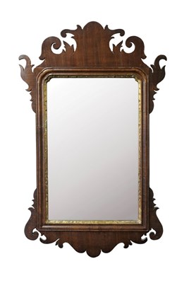 Lot 554 - A George III fret carved wall mirror, 57cm high