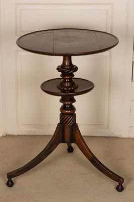 Lot 563 - A 19th Century oak tripod table with lower...