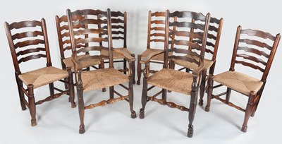 Lot 566 - A set of eight ladderback dining chairs...